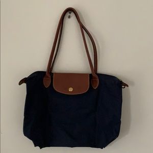 Medium, navy blue longchamp bag